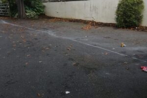 Faded markings on tarmac before re-painting