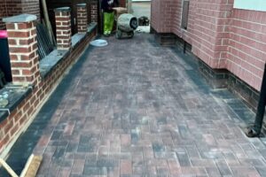 Completed block paving driveway with brick edging